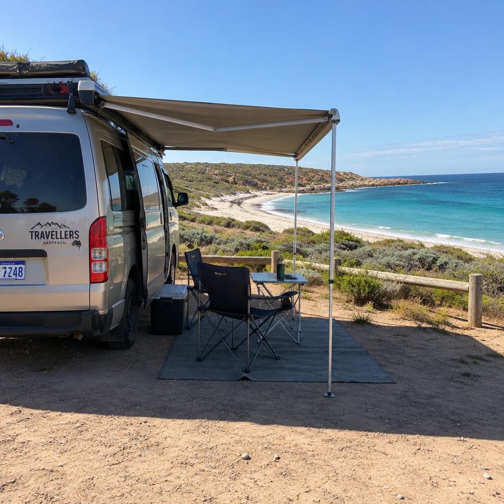 Campervan with awning set up by a Western Australian beach
